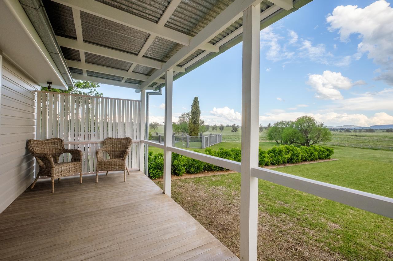 Goonoo Goonoo Station Hotel Tamworth Exterior photo A view from the balcony of a two-bedroom apartment at the Village at the Park